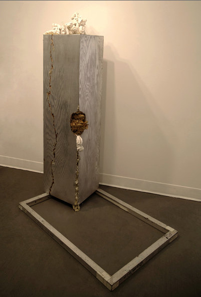  rooted &nbsp;:  Rooted. A frame becomes a display platform, a plinth becomes a tree with mushrooms growing from it, fingers as fungi.  metal frame, wood, plaster, wax, mushrooms.  &nbsp;62 x 48 x 36 inches, 2014. 