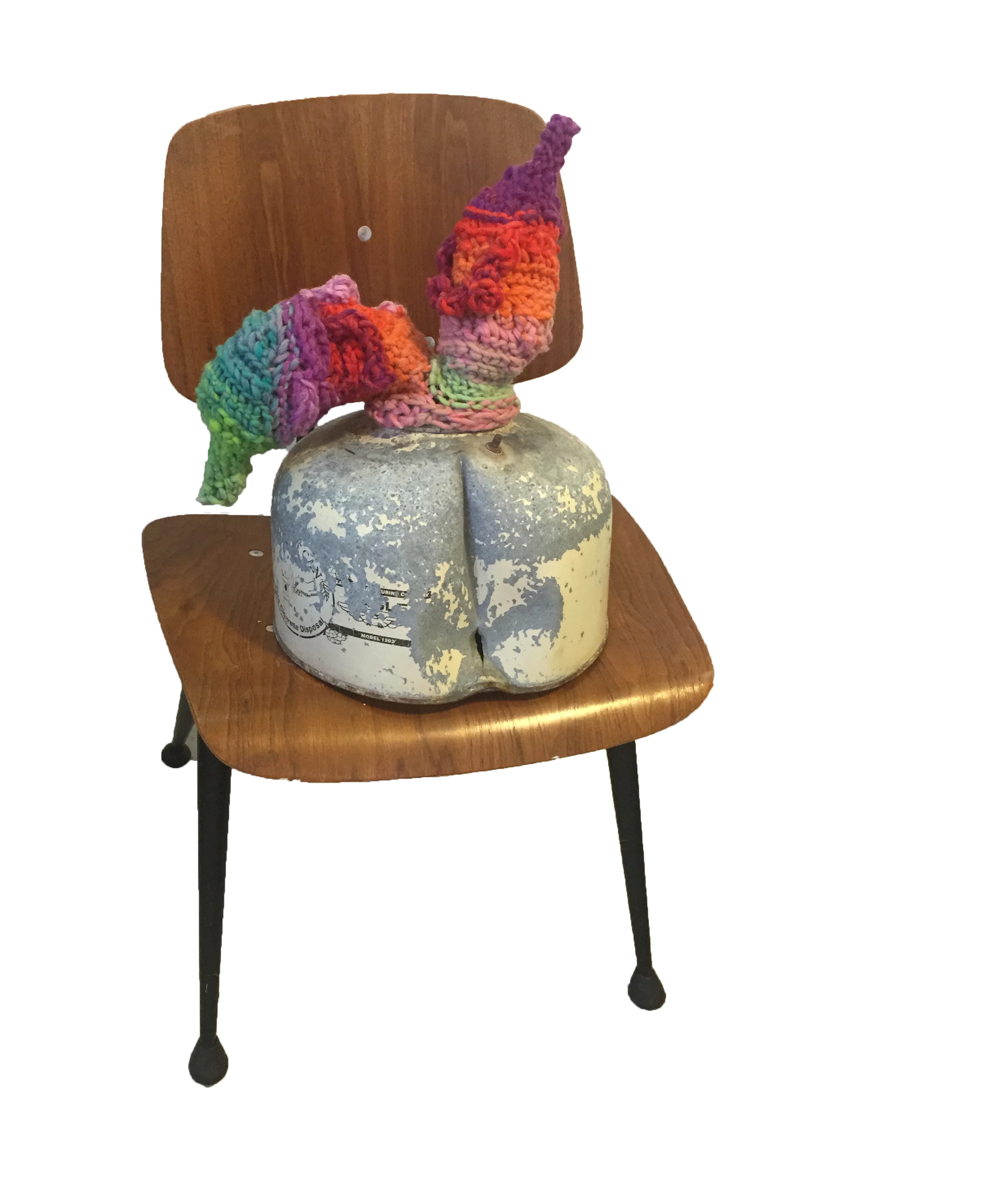 butts and such gendered stool series. 2016, 38 x 20 x 20 inches. Found cigarette butt disposal can, chair, yarn. A chair has always been a stand in for a human body. In the gendered stool series, I add anatomy that transform them into fertility sculptures. In this case a cigarette (butt) bucket becomes an opening in a crevice that suggests either the vulva or the buttox. Animated knit additions could be either phallic or breasts. 