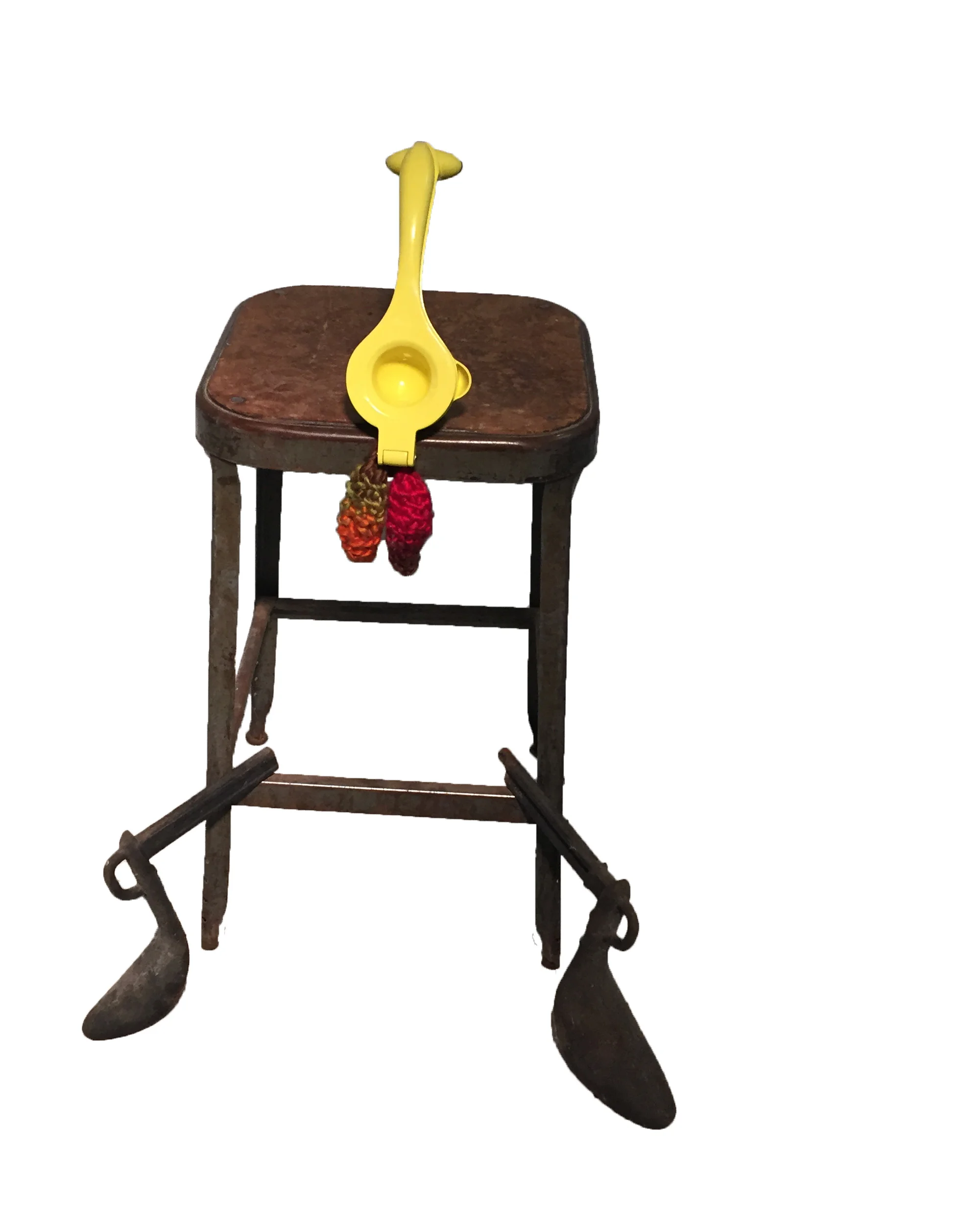 manspread, gendered stool series. 2016, 33 x 14 x 16 inches, lemon press, found stool, yarn. This lemon press balances perfectly on the edge of the stool and alludes to a phenomenon that plagues the subways, These objects navigate the space between pathos and humor. 