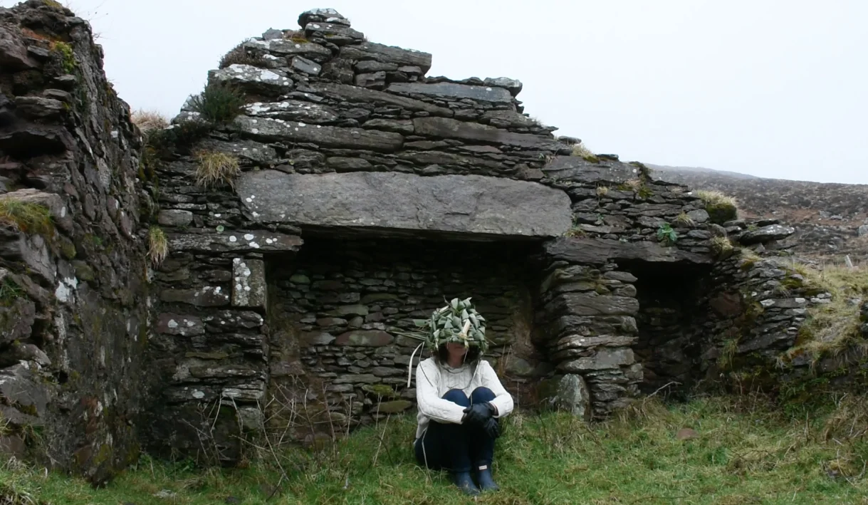  ceremony in stone cottage with mask. 