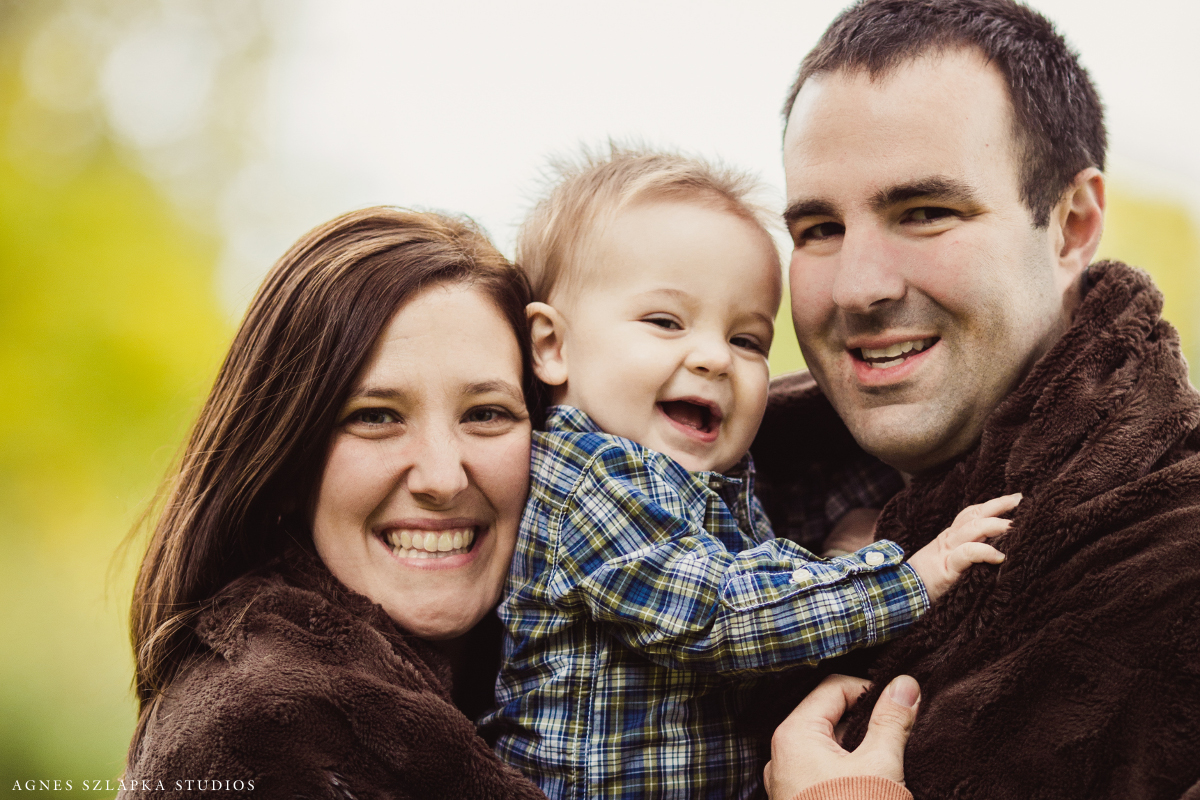 family of three wrapped with blanket-nine month old baby boy | cleveland, ohio portrait photographer
