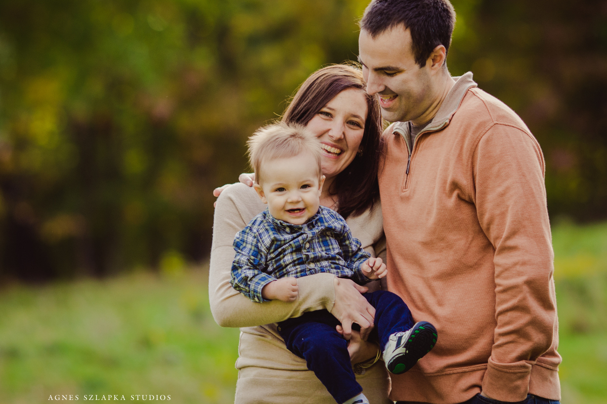 family with nine month old baby boy in park during fall | cleveland, ohio lifestyle photographer