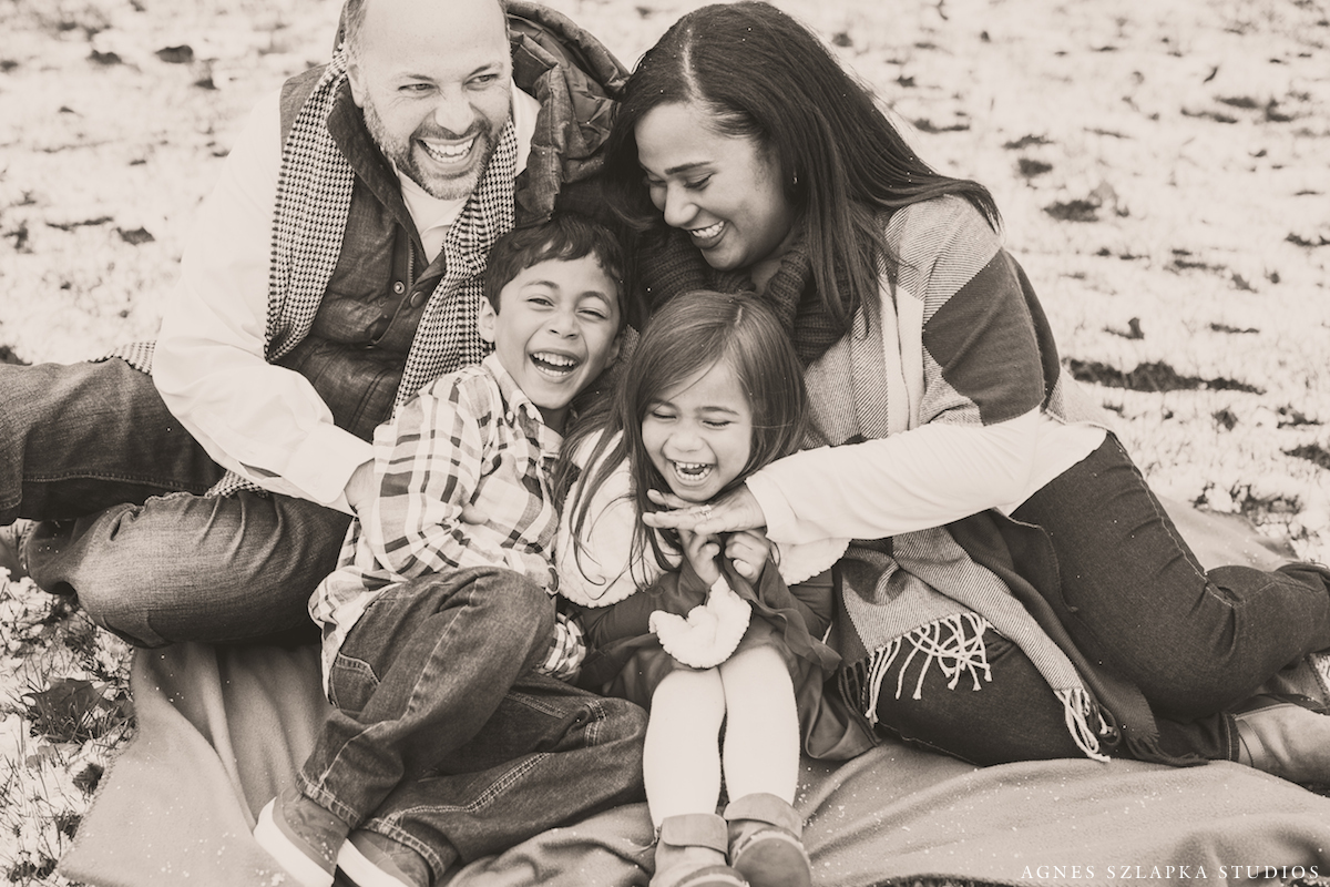 family of four laughing hysterically with each other | cleveland, ohio lifestyle photographer