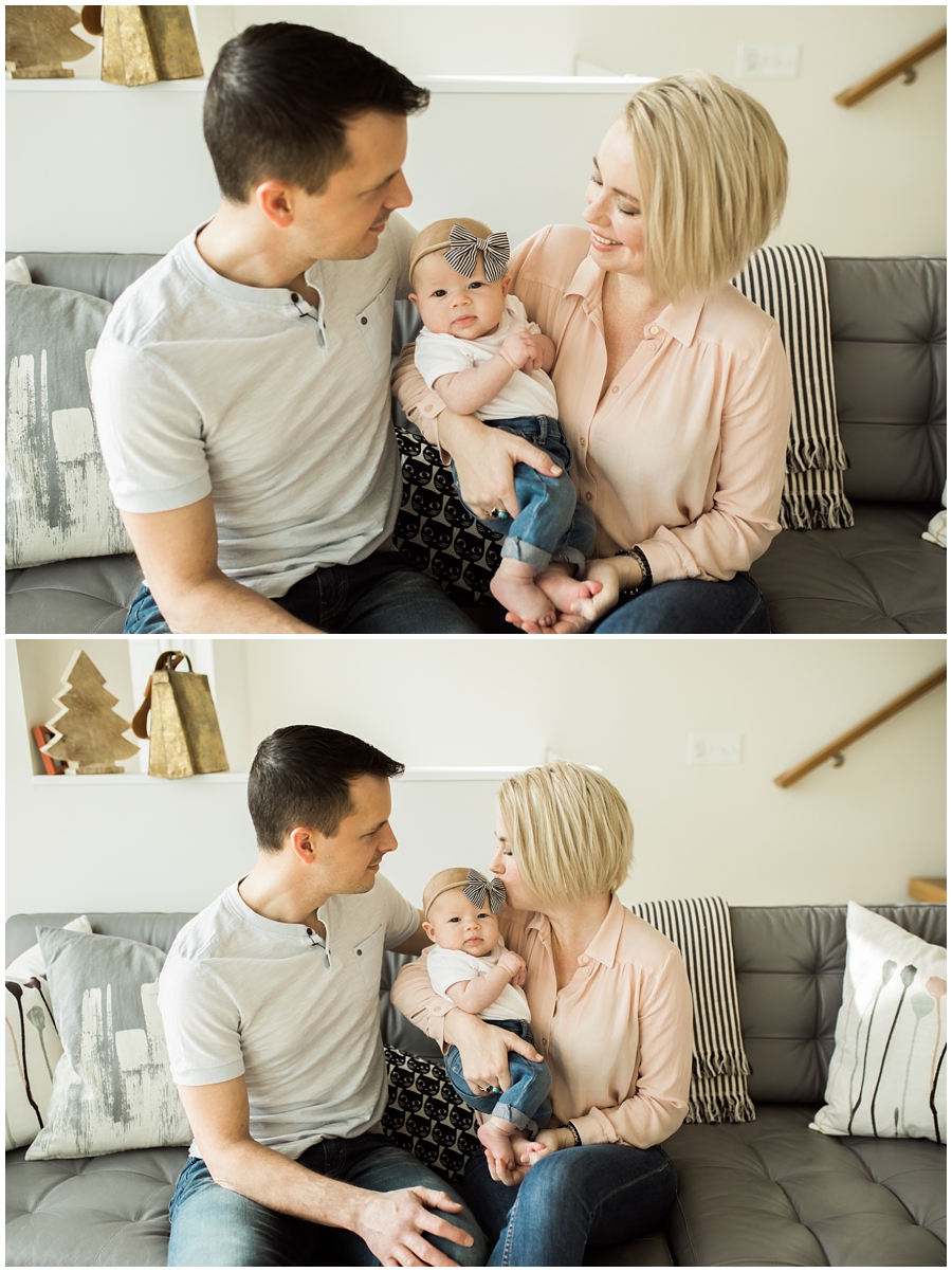 family of three with baby girl on living room couch | cleveland, OH newborn photographer