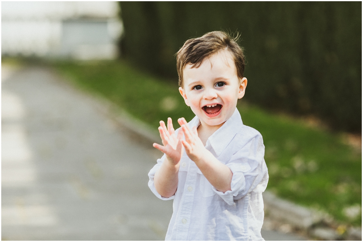 one year old boy clapping and smiling | cleveland, oh family photographer