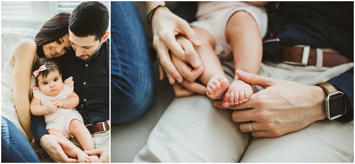 family of three sitting on white couch | cleveland OH baby photographer 