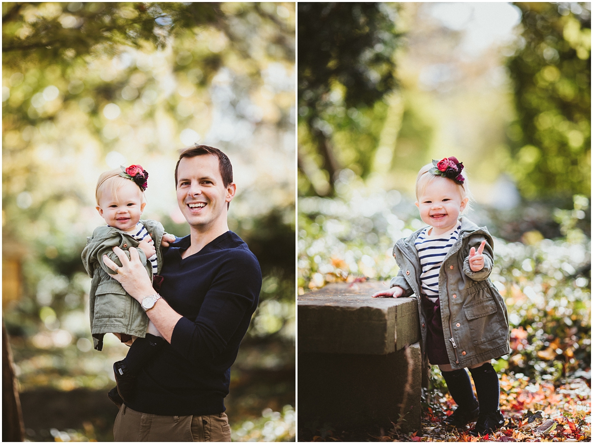dad holding smiling baby girl in arms | cleveland, baby photographer