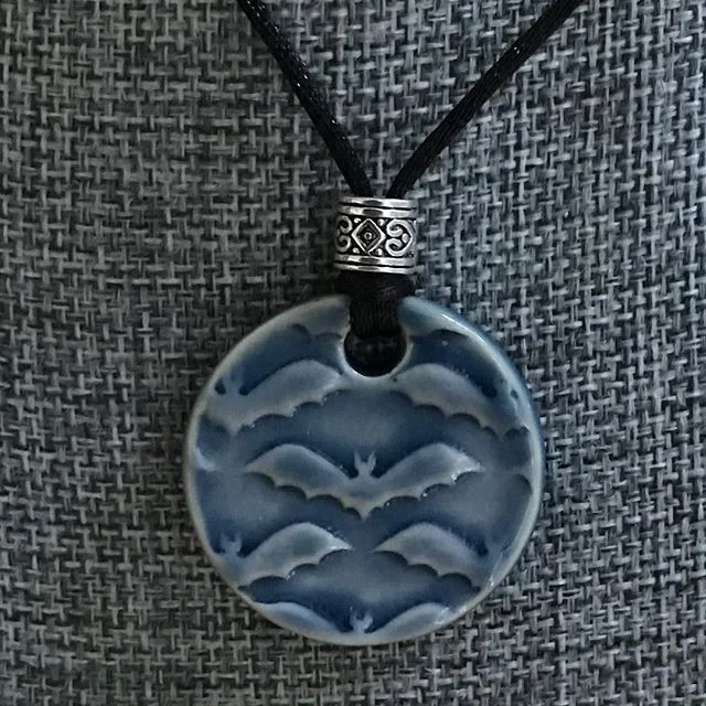 CeledonBatNeckaceRoundCeramic.jpg