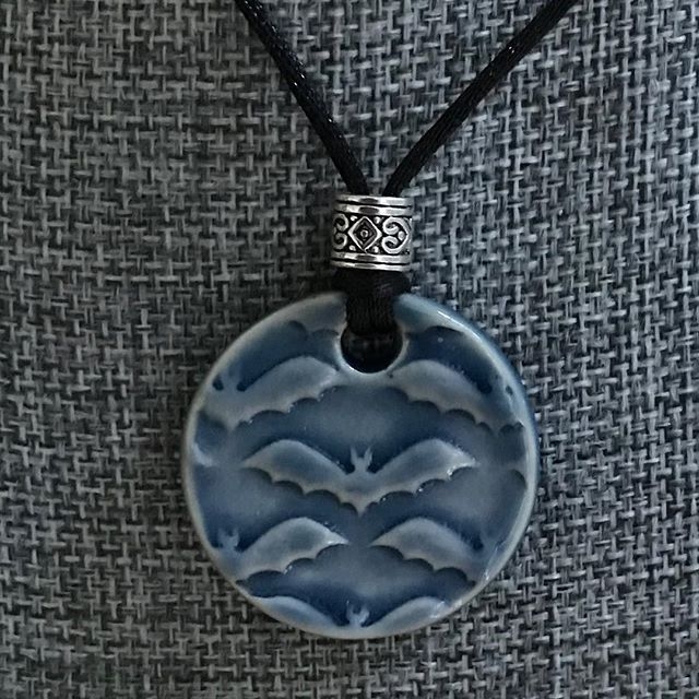 CeledonBatNeckaceRoundCeramic.jpg