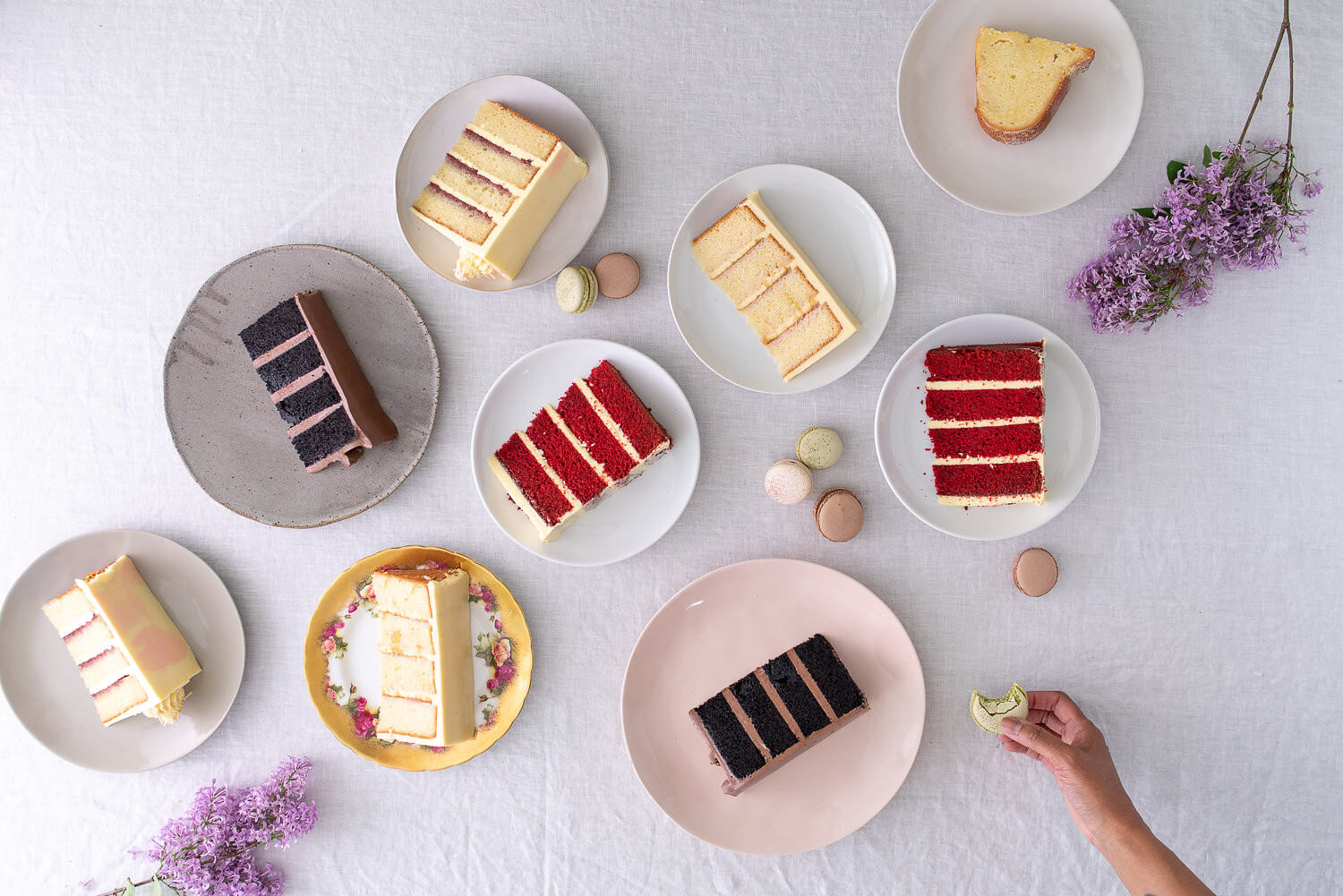 signature organic celebration cake slices french macarons.jpg
