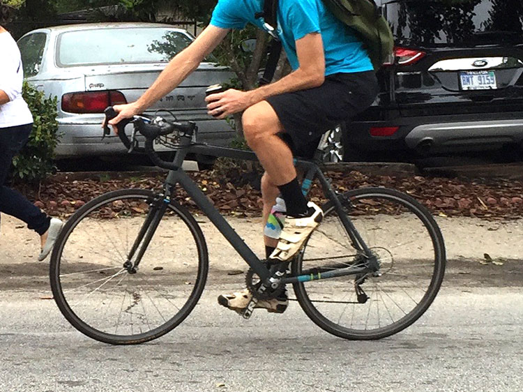 This bike looked cool, but I'm not sure what brand it is. It has a SRAM force crankset, but the rings are awfully small - like, CX small - but it doesn't have canti brakes. Anyone know?