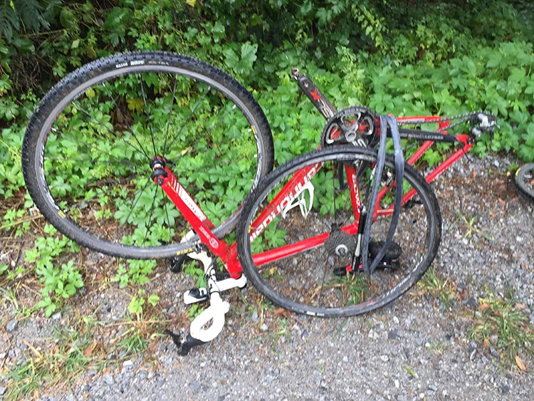 Another flat - this is on the unpaved portion of the Beltline, coming back from a rainy Saturday training session with a teammate.