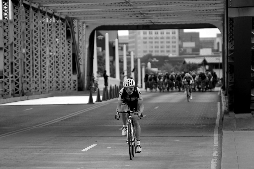 “Bridge” I like the artistic components about this one. It also tells the story about the one rider in the break and one attempting to bridge the gap.