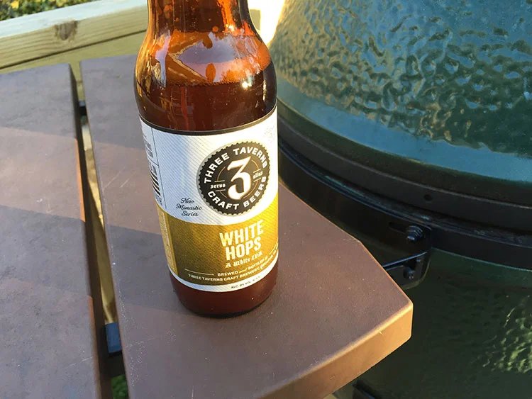 Grilling on the green egg, enjoying some Three Taverns goodness.