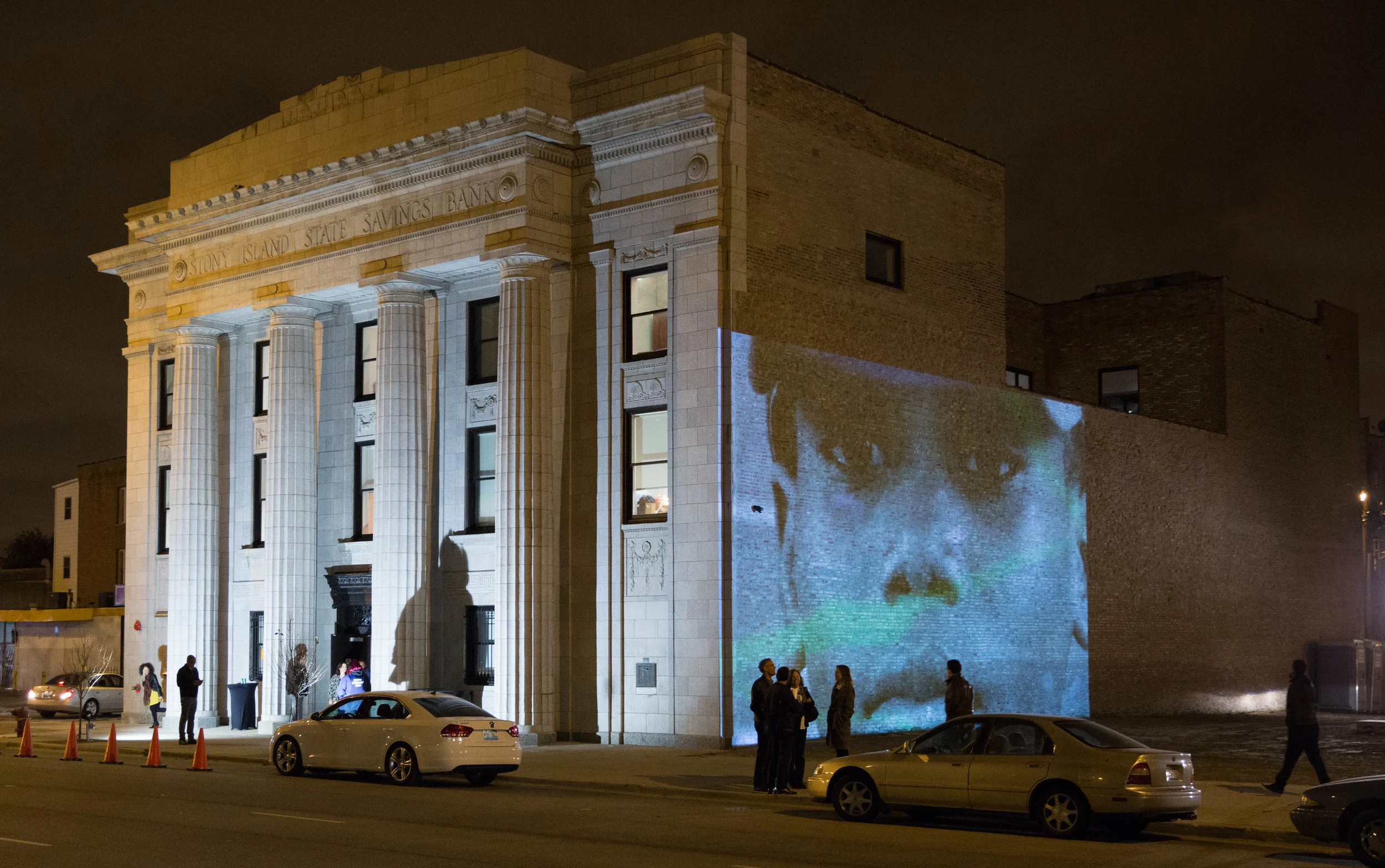 Video Projection highlights the Rebuild Foundation's Stony Island Arts Bank on the evening of its Public Opening attended by 1,400 guests. 