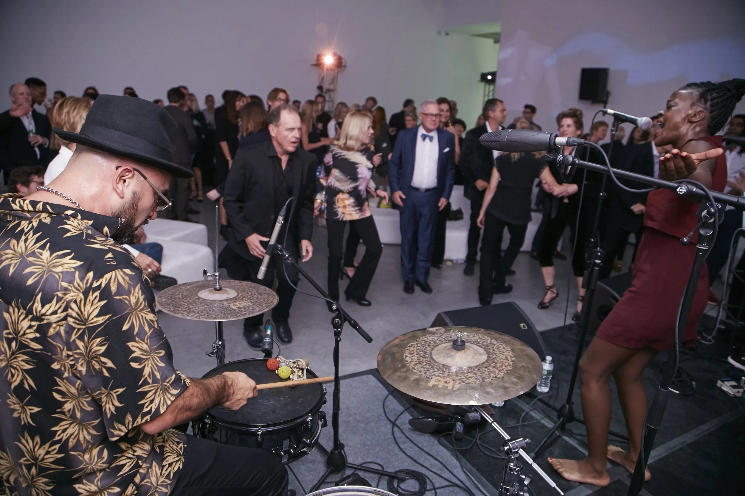 Guests enjoying performance by The Johnny Freelance Experience and special video mapping projection by VJ Ton Ton for Marianne Boesky Gallary's 20 Year Anniversary Celebration. Photograph Courtesy: Scott Rudd Productions. Inc.