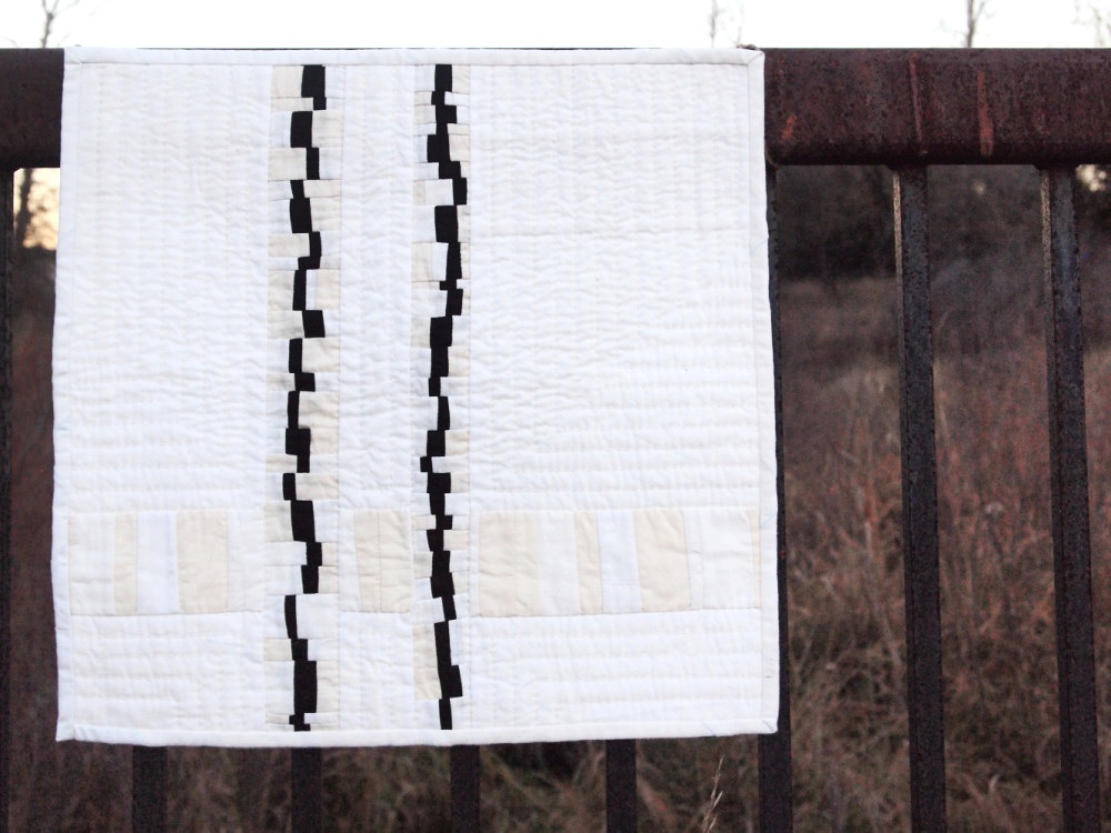 Quilt no. 018: Storied Minimalism. 2015. Vintage black silk, feedsacking, quilting cottons. 18″ x 18″