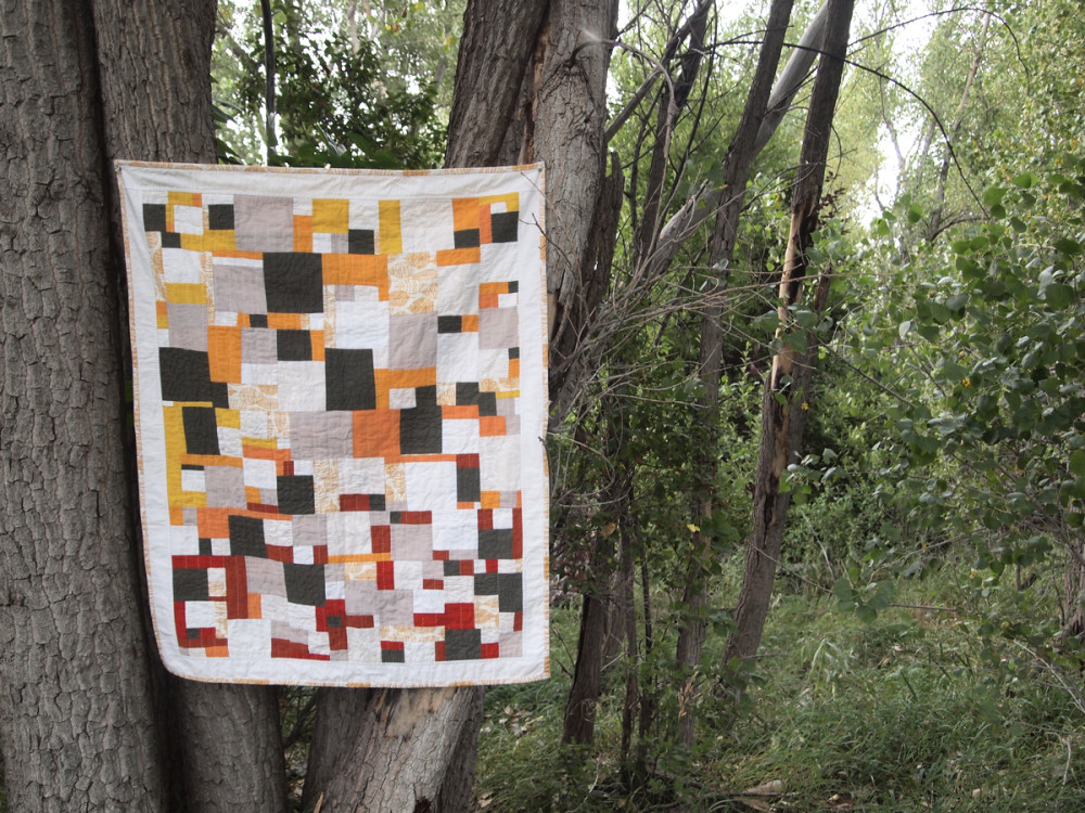 Quilt no. 016: Floating Squares. 2015. Various quilting cottons. 34″ x 43″