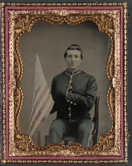 Soldier in Union Cavalry Uniform Holding American Flag | Circa 1861-1865