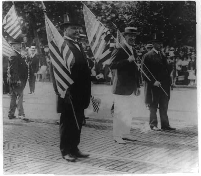 Woodrow Wilson Carrying Flag in Parade | Circa 1916