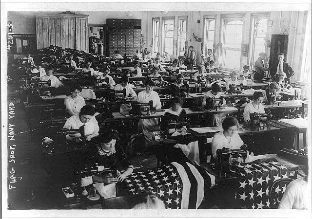 Navy Yard Flag Shop with Women Sitting at Sewing Machines Making Flags | Circa 1917