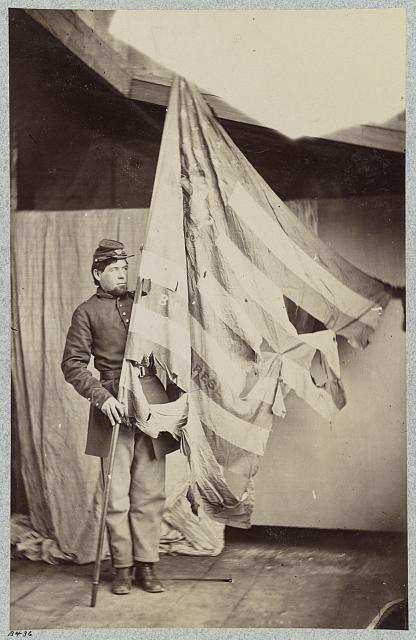 Soldier Holding the Battered Flag of the 37th Pennsylvania Infantry | Circa 1861-1865