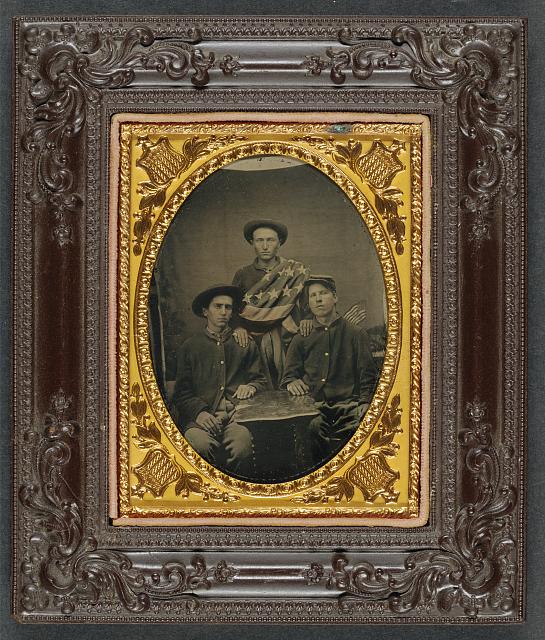 Three Soliders in Front of Painted Backdrop Showing 34 Star American Flag | Circa 1861-1865