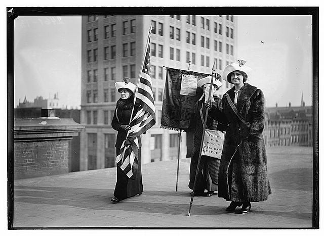 Three Suffragettes with Leaflets and the US Flag | Circa 1910