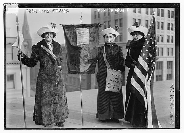 Three Suffragettes with Leaflets and the American Flag | Circa 1910