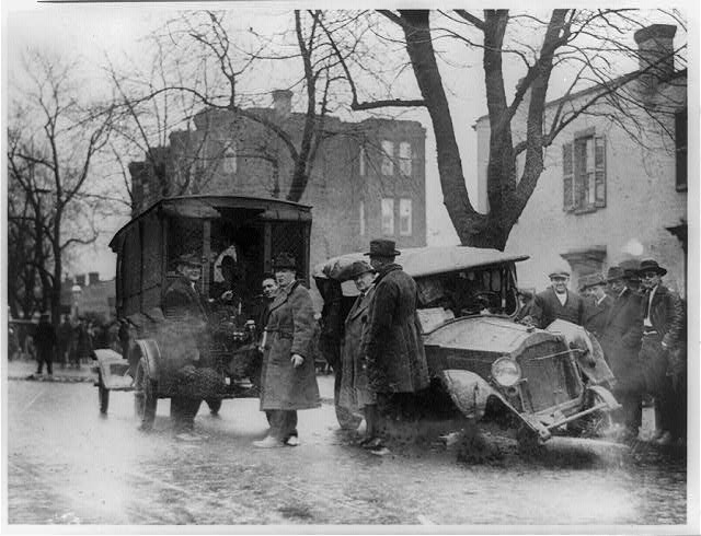 The Aftermath of a Thrilling Chase Through the Busiest Streets of Washing, a Pair of Bootleggers and Their Car Come to Grief at the Hands of the Capitol Police | Circa 1922