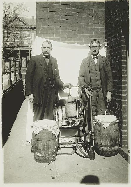Two Men Posing with a Whiskey Still | Circa 1920