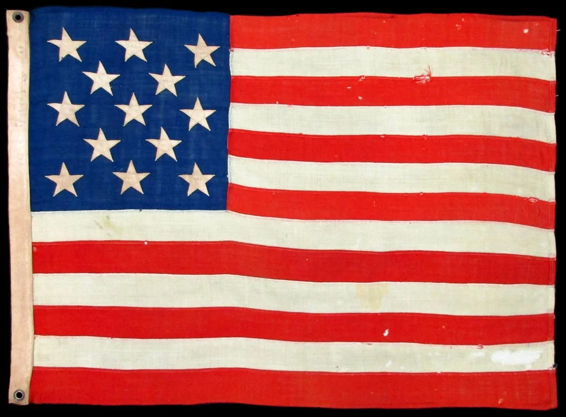 Closeup of 13 Star Antique US Flag with R.H. Macy Stencil