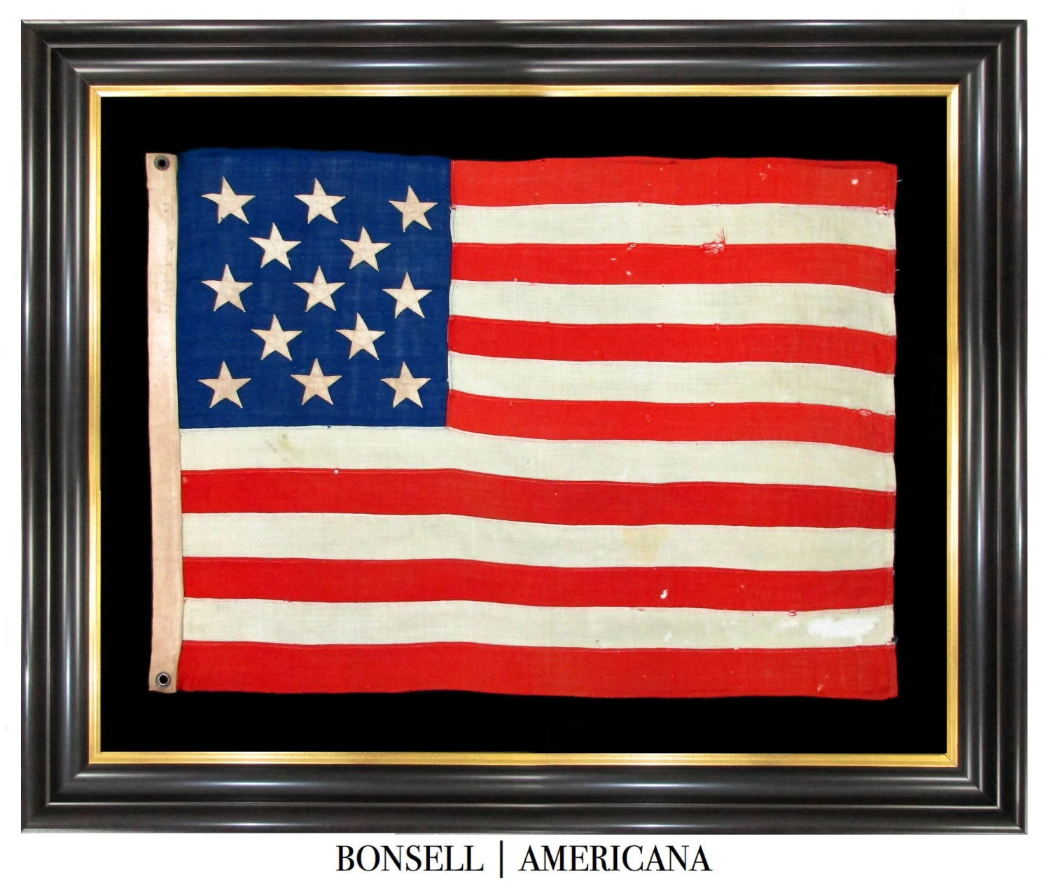 Framed 13 Star Antique US Flag with R.H. Macy Stencil