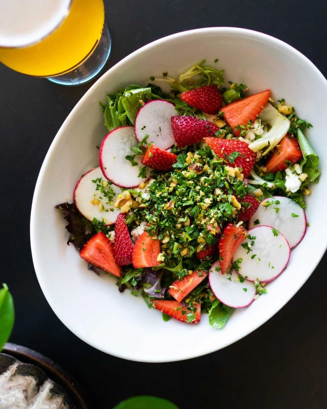 Talk about a summer dish&mdash;our Strawberry Fields Salad is back on the menu at both #Block15 locations. 🍓

Strawberry Fields features a bed of @gatheringtogetherfarm salad greens tossed in herb-citrus vinaigrette and topped with @riverlandfamilyf