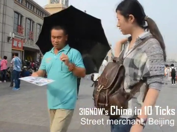 10 Ticks in China: A street merchant hawking his wares in Beijing