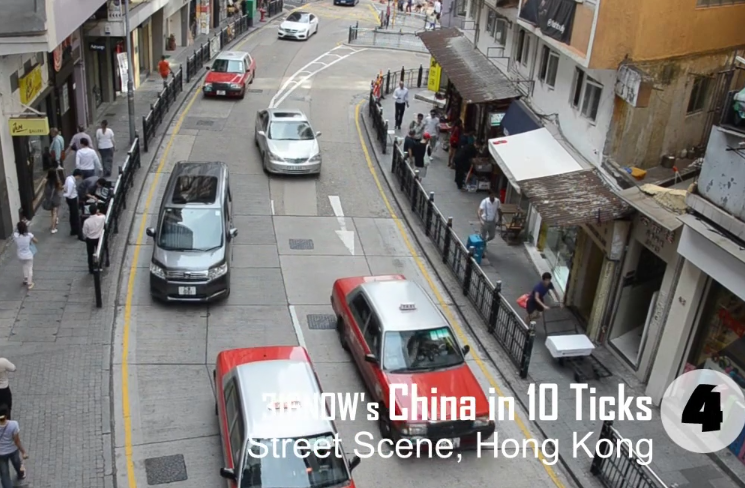 10 Ticks in China: A street scene in Hong Kong