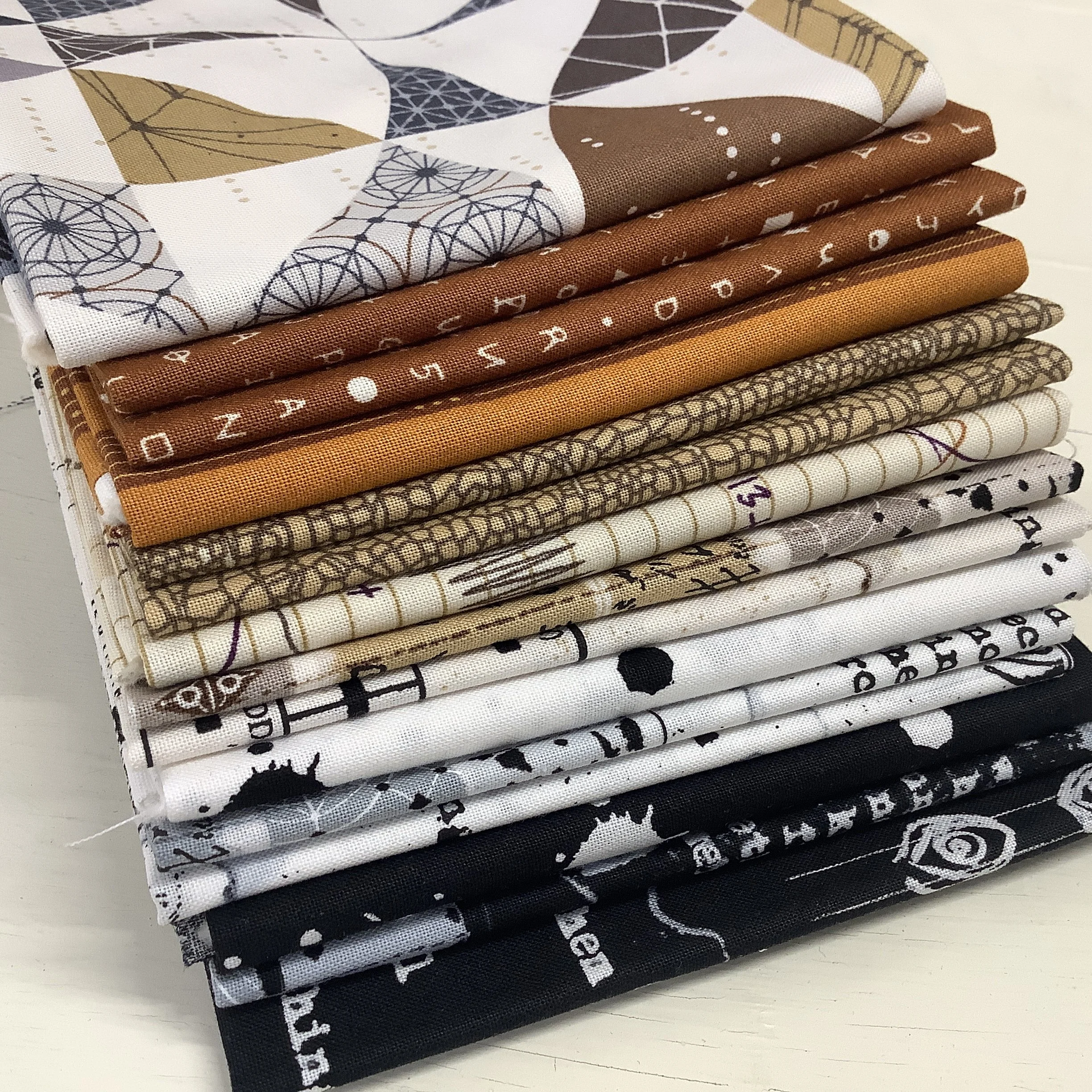 Sleuth-fat-quarter-bundles-Giucy-Giuce-Hometown-Rochester