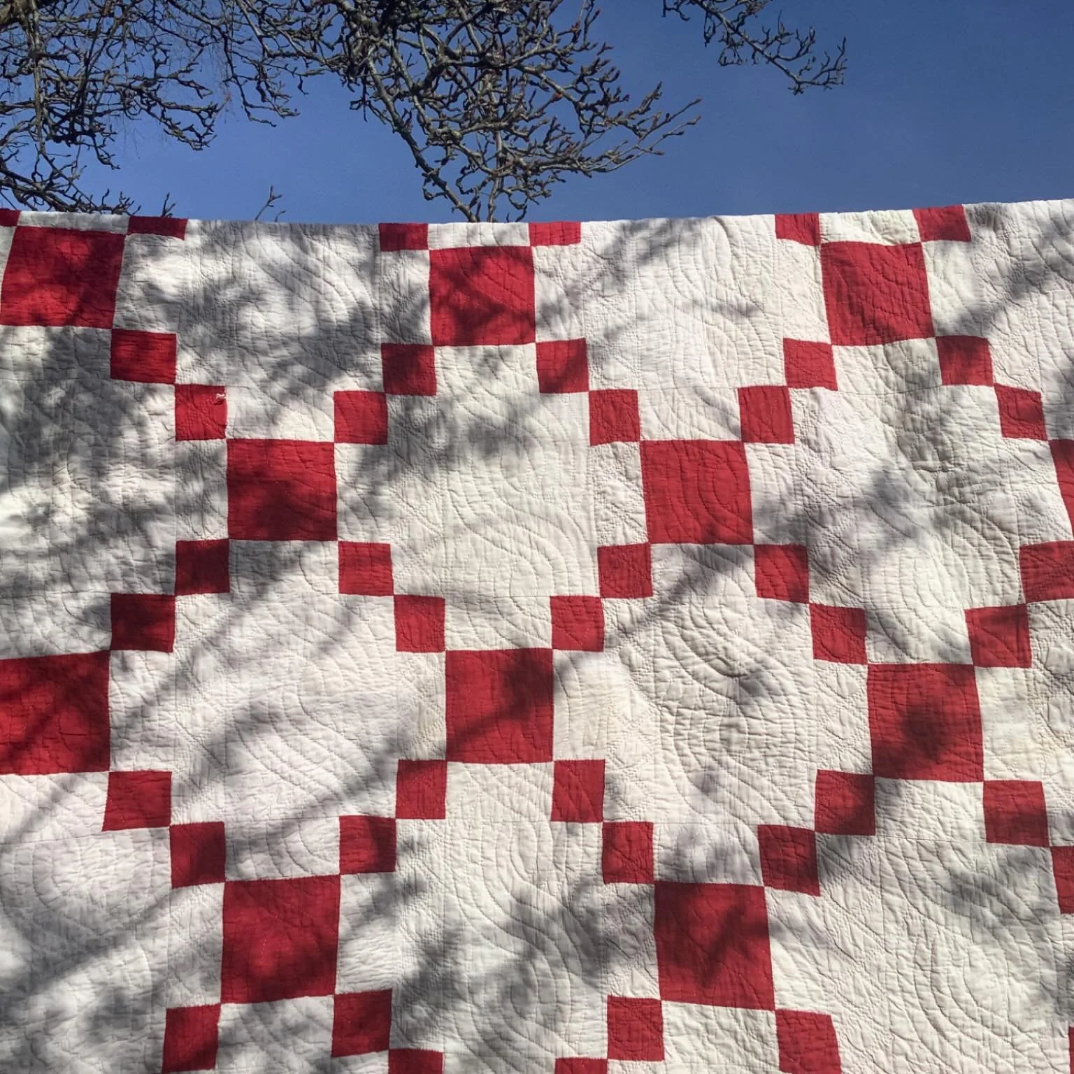Have you seen the stunning quilt in our Christmas window? Sewn in the 1920s, by a quiltmaker called Jenny, the pattern is called Puss in the Corner. Jenny was a maid in a household in Yorkshire and she stitched it for her employers. 

The quilt&rsquo