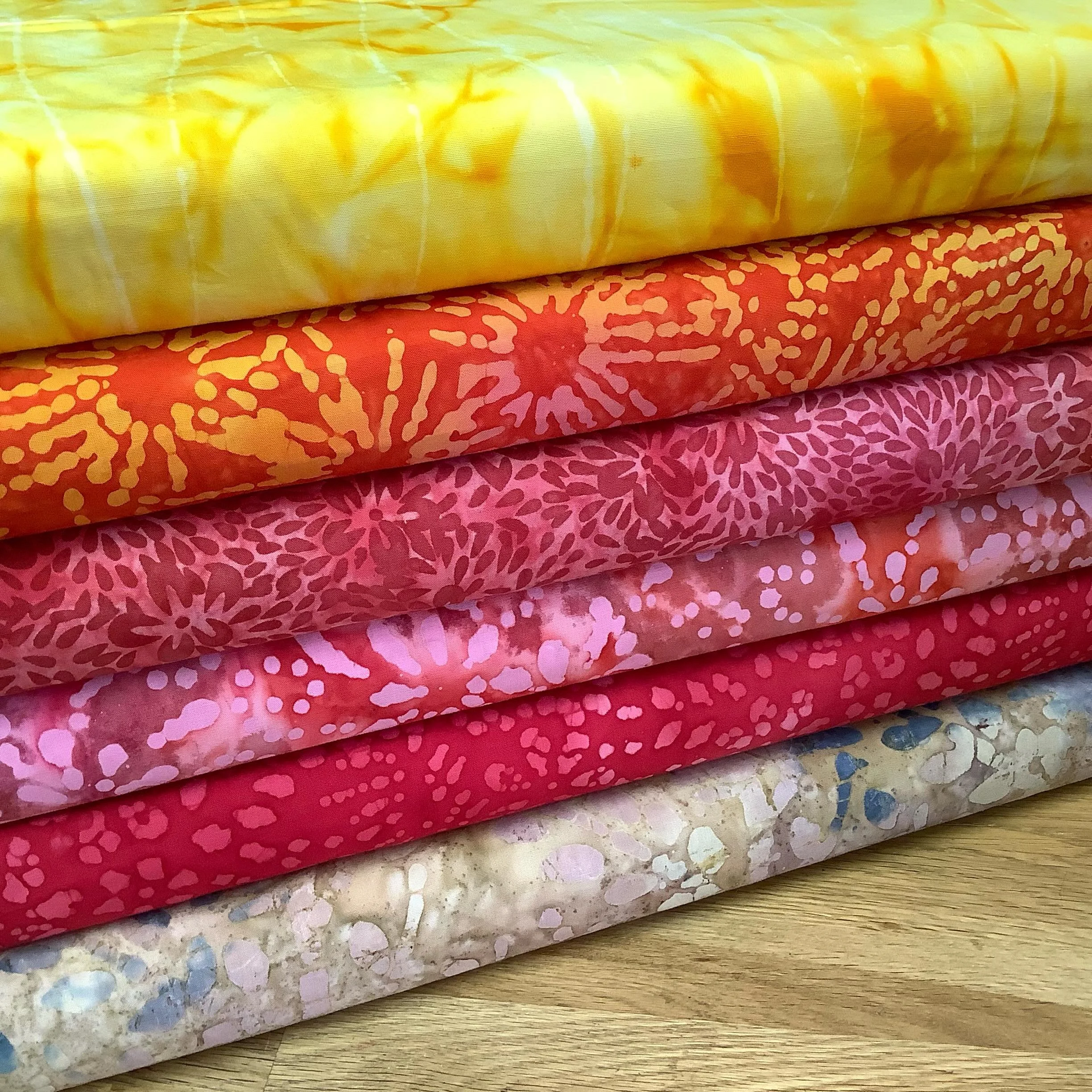 Good morning sunshine! Just soak up the sunset vibes from these new batiks. 

Remember that Operation Pint Pot is in full swing instore, to make some shelf space. Simply finish a bolt of a patterned quilting fabric and you&rsquo;ll save a super sunny