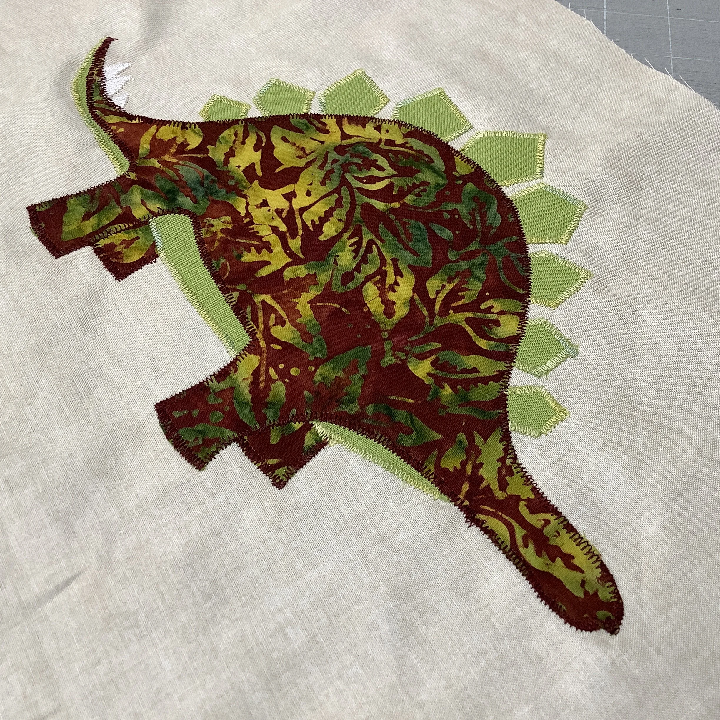 Dinosaur-applique-Hometown-Rochester-Kent