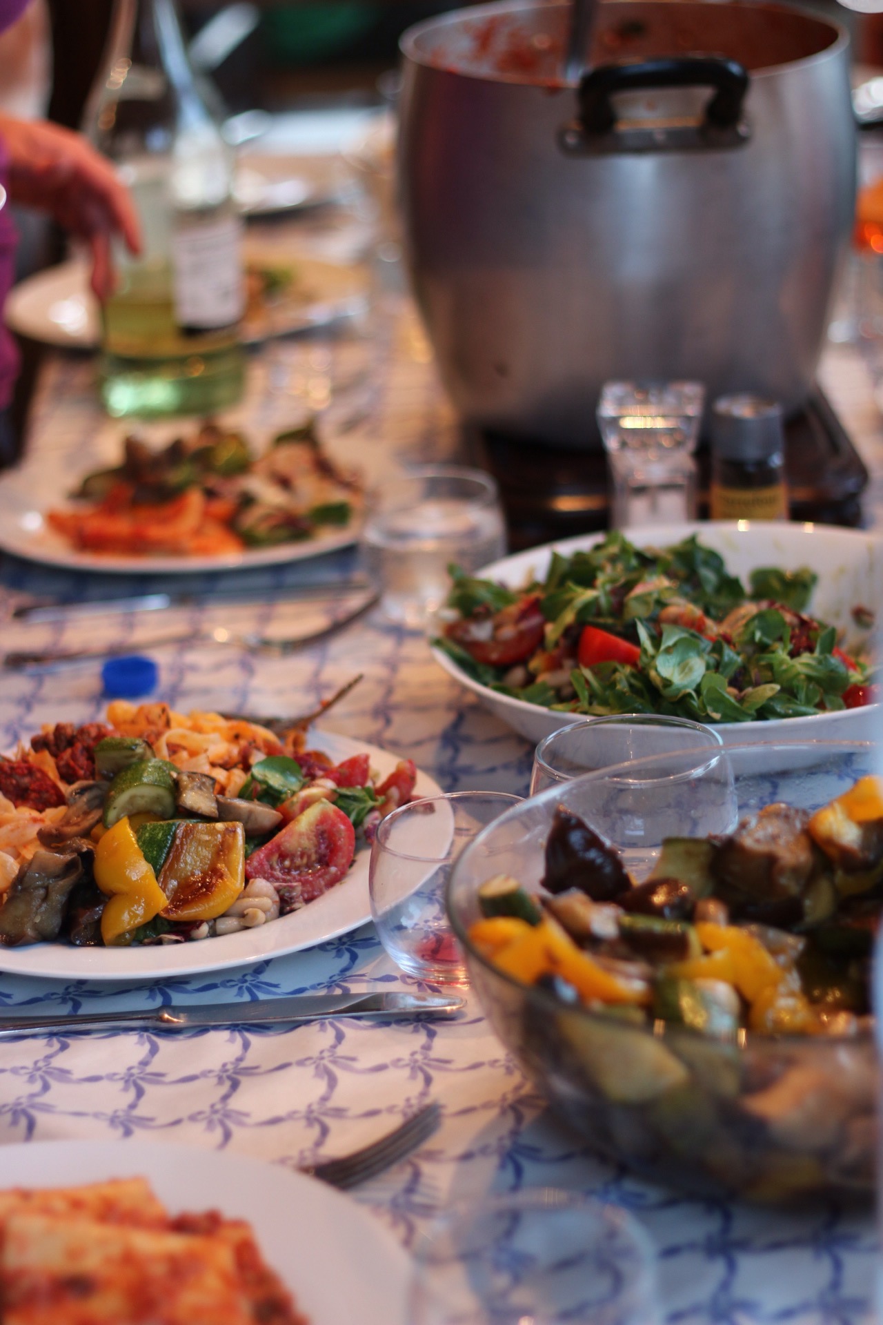 A table full of delicious food and happy eaters!