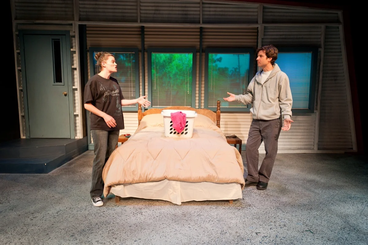 Christin Davis and Dusty Brown in Reasons to be Pretty (2011).