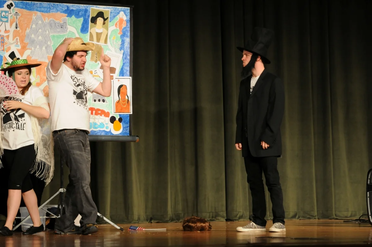 Sarah Jane Robinson, Asa Tims, and Quinn Gassaway in The History Show (2012).