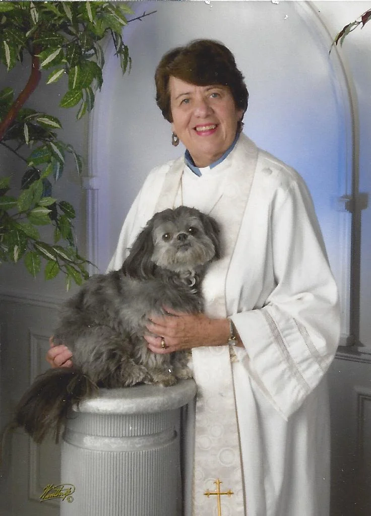 Cynthia Crosson-Harrington and her service dog for ministry, Dandi.