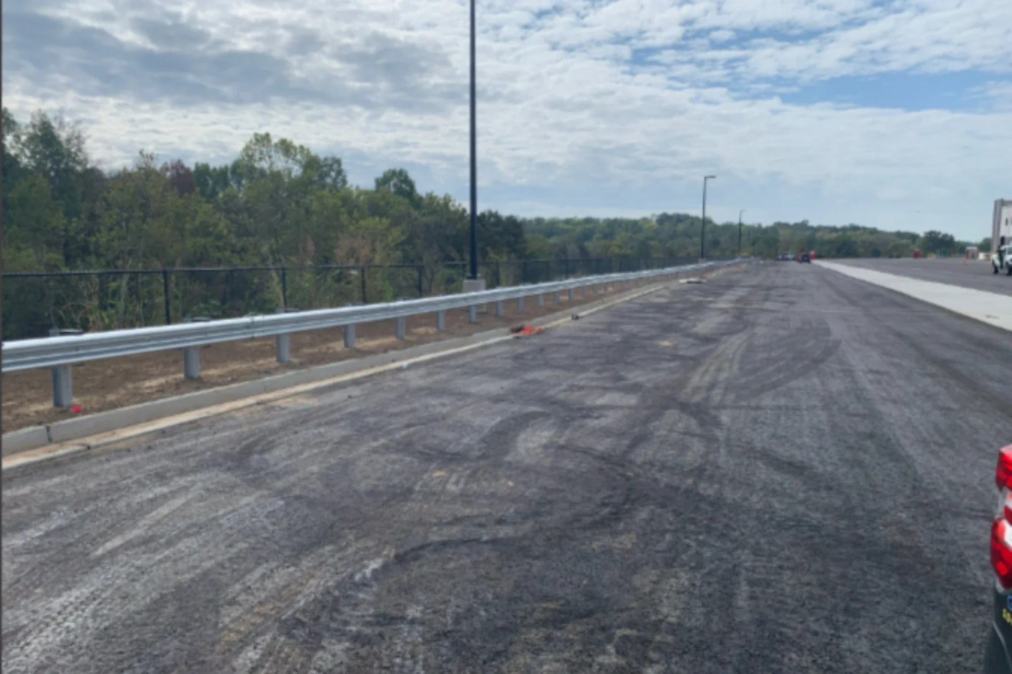 K&C Fence installs commercial guardrail along a roadway at the Hermitage Logistics Center.