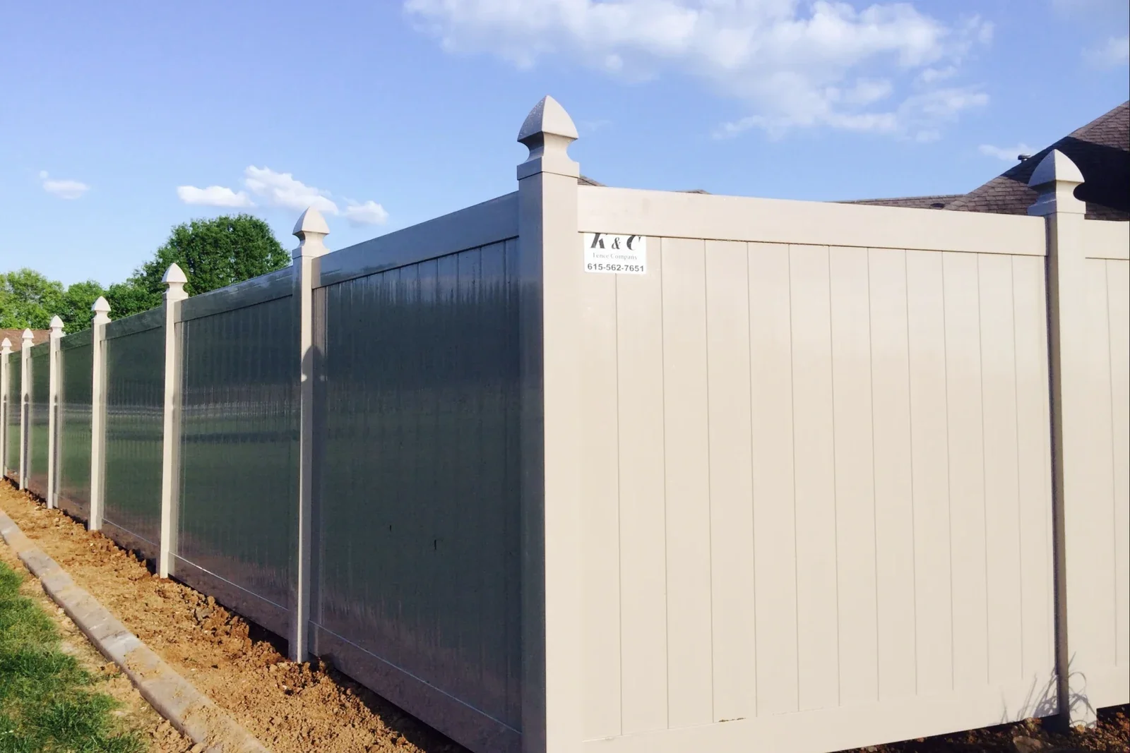 K&C Fence installed a clay-colored PVC privacy fence with decorative posts in Nashville, Tennessee.