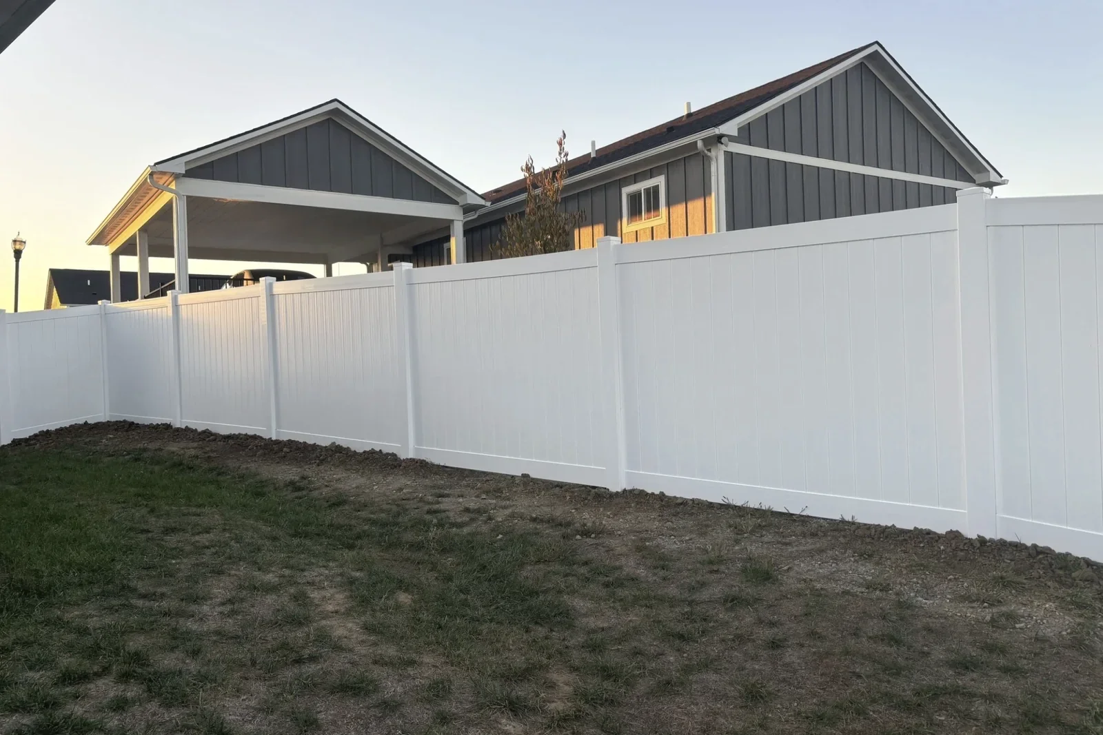 K&C Fence installed a white PVC vinyl privacy fence around a Nashville residential property.