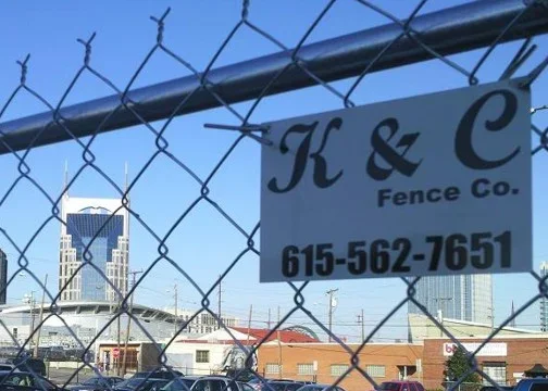 Chain link fence installed by K&C Fence providing secure perimeter protection for a commercial property in Nashville, Tennessee.