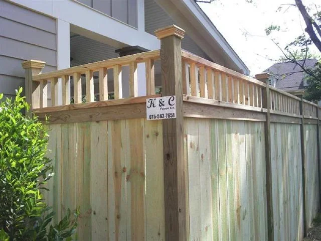 Custom wood fence with decorative top rail built by K&C Fence to enhance backyard privacy and curb appeal in Nashville, Tennessee.