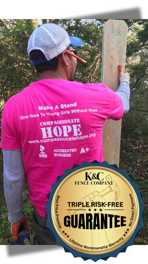 A K&C Fence crew member installs a wood fence post while supporting the Compassionate Hope Foundation, highlighting K&C Fence’s community impact in Gallatin, Tennessee.
